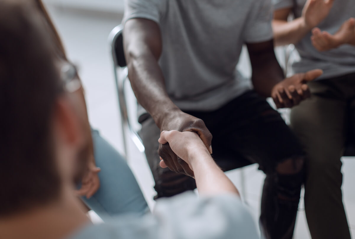 Patients shaking hands