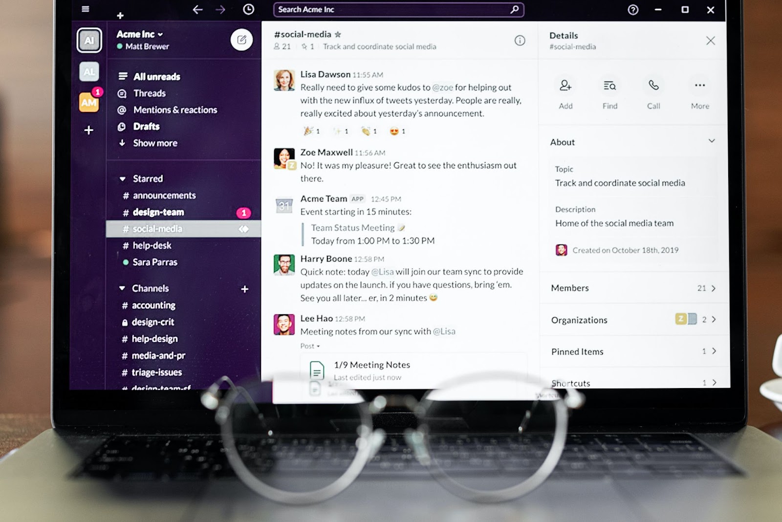 An image of a generic Slack screen on a laptop, showing channels on the left and Slack's messaging layout.