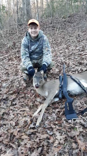 outdoorsman JC with a deer