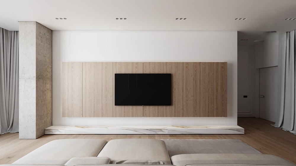 Vách tivi căn hộ sử dụng tấm gỗ xếp dọc theo tường trắng