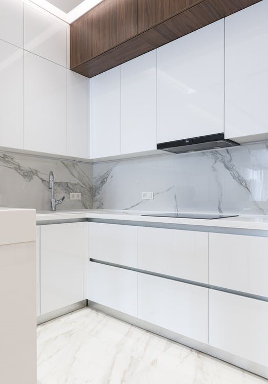 Free White furniture in light modern kitchen Stock Photo