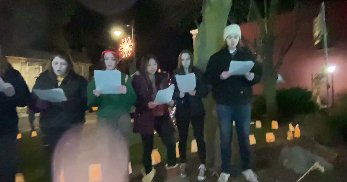 High School Chorus Students Singing Carols.MOV