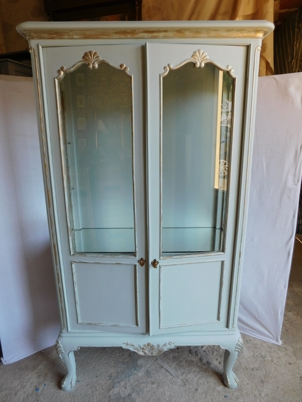 Shabby chic glass display cabinets to lend weathered charm