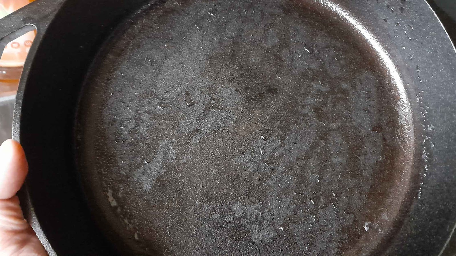 Skillet after pouring out water and vinegar solution.
