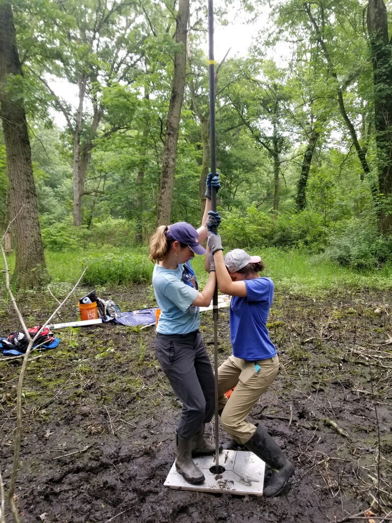Katie working with students in the field