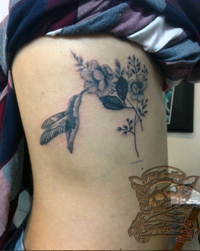 Flower Themed Rib Tattoos 15