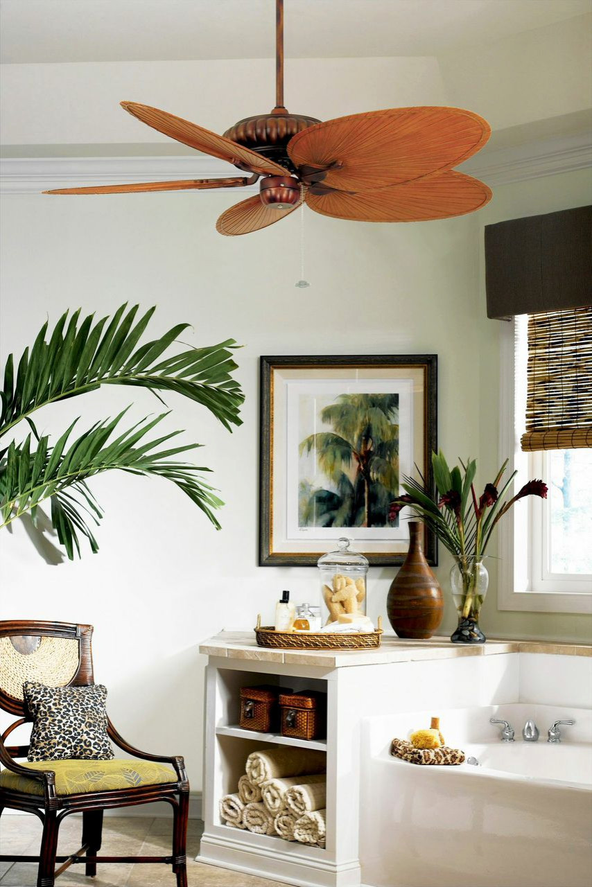 Tropical bathroom complete with a ceiling fan that looks like banana leaves