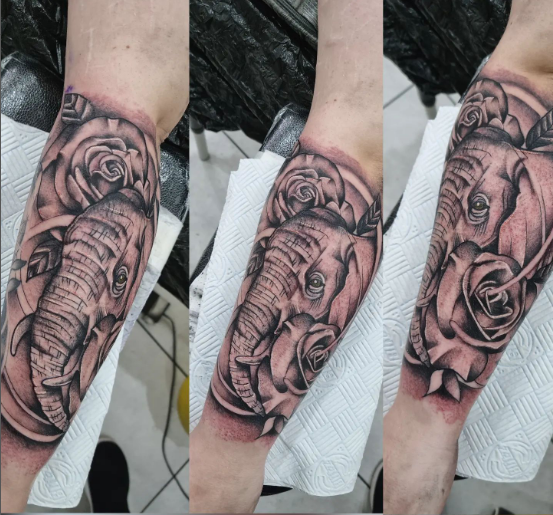 Elephant With Rose Tattoo On Forearm
