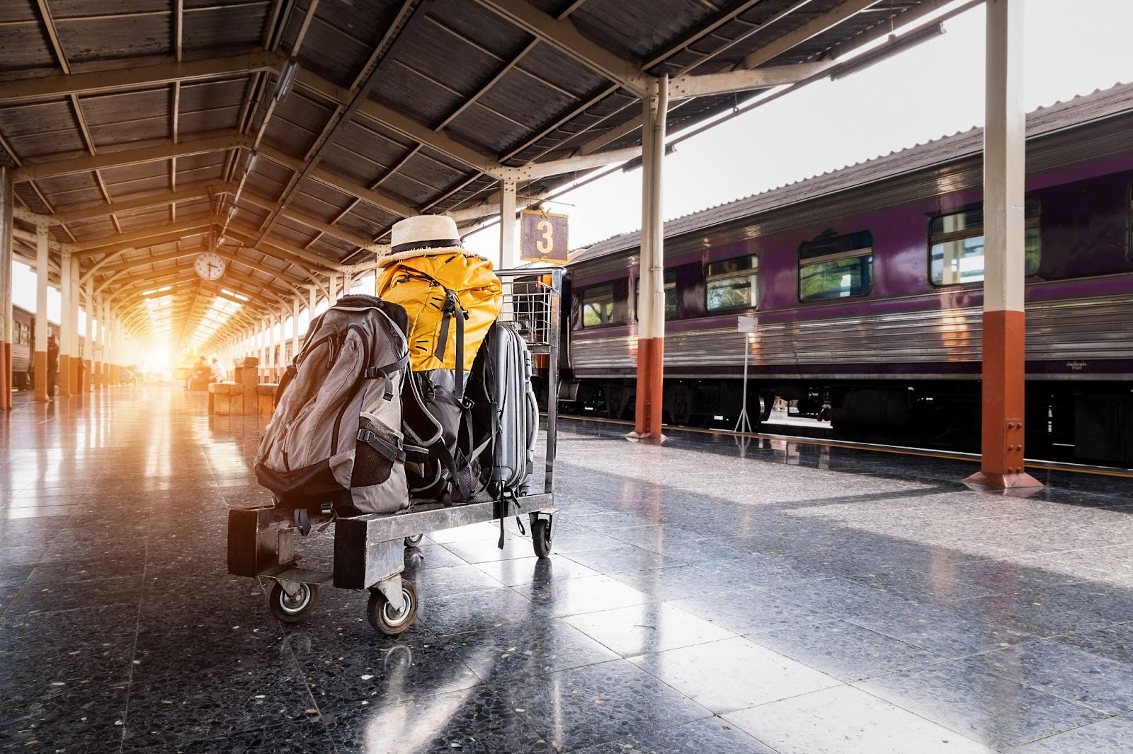 Abandoned luggage in a cart at a train station