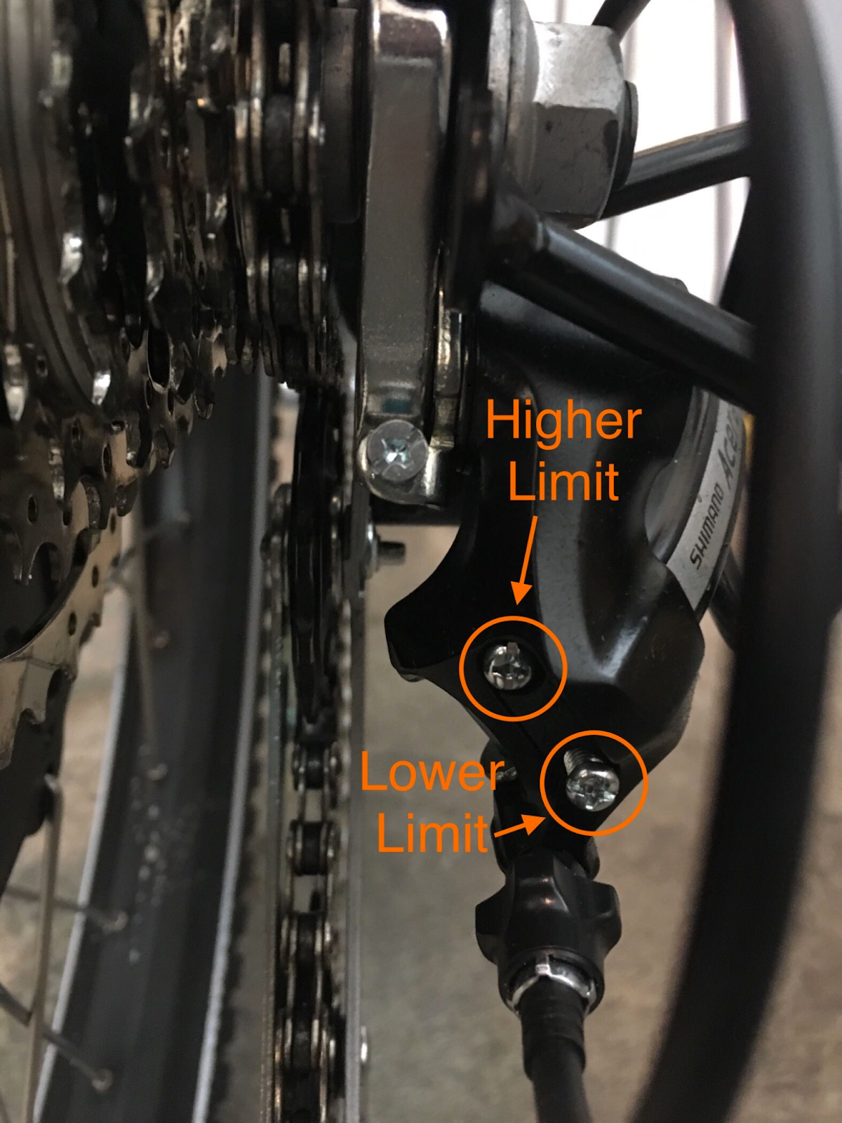 The various crews on the rear derailleur can be adjusted to tighten or loosen the mountain bike chain tension to make gear changing easier and smoother.