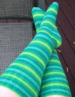 person wearing green striped socks