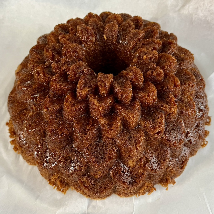 Carrot Cake baked in a Chrysanthemum bundt pan showing most of the detail with a little definition lost near the center..